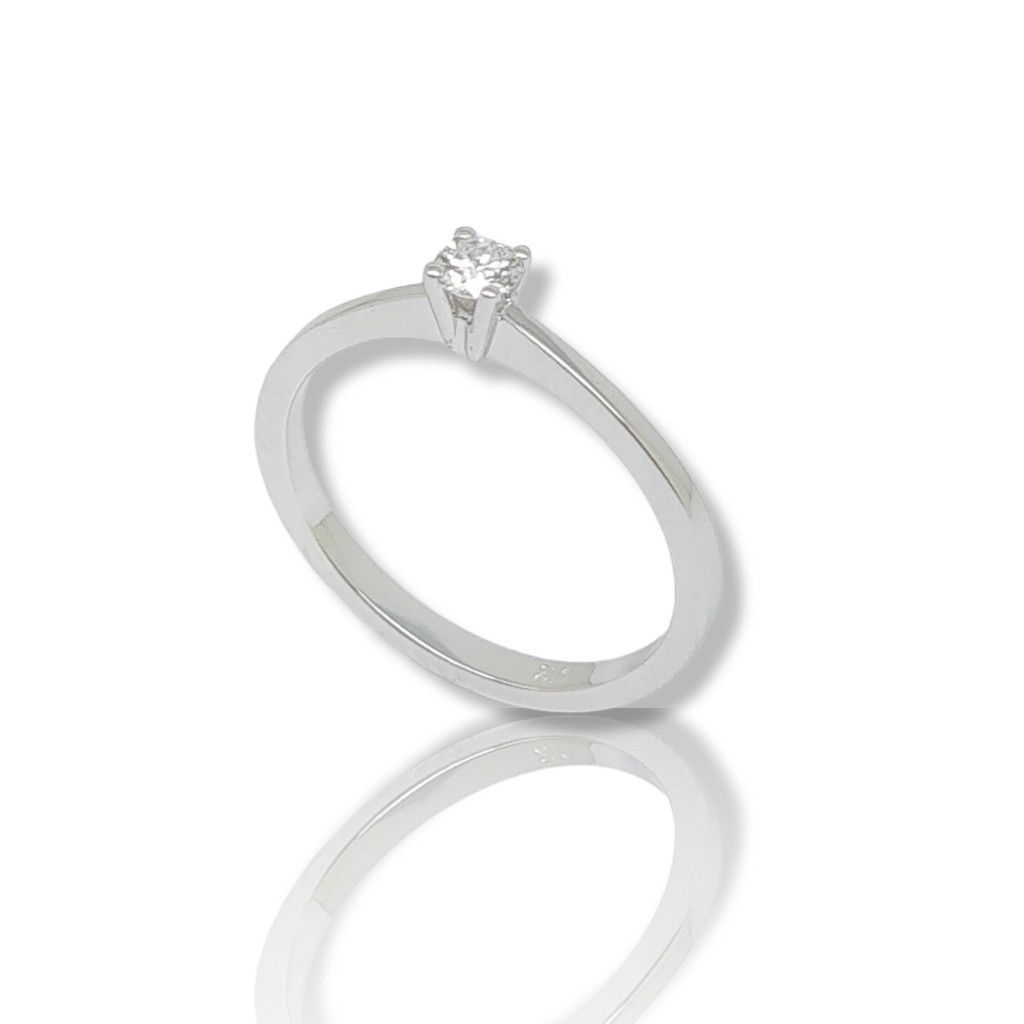 White gold single stone ring k18 with diamond fitted on V shaped bezel and four stripes (code T1895)
